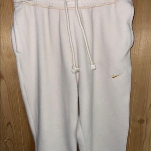 cream colored nike sweatpants